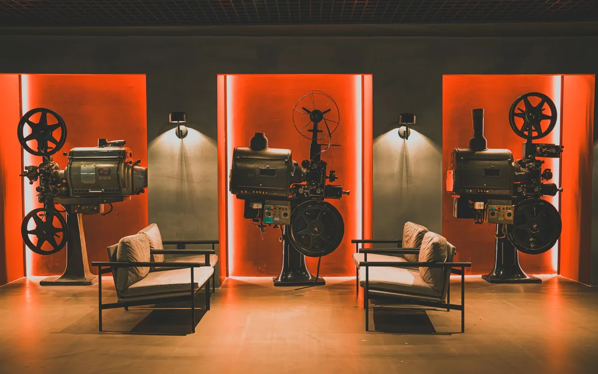 A film projector in a dark room