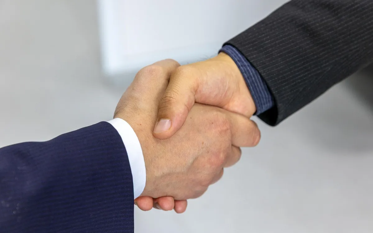 A meeting and handshake