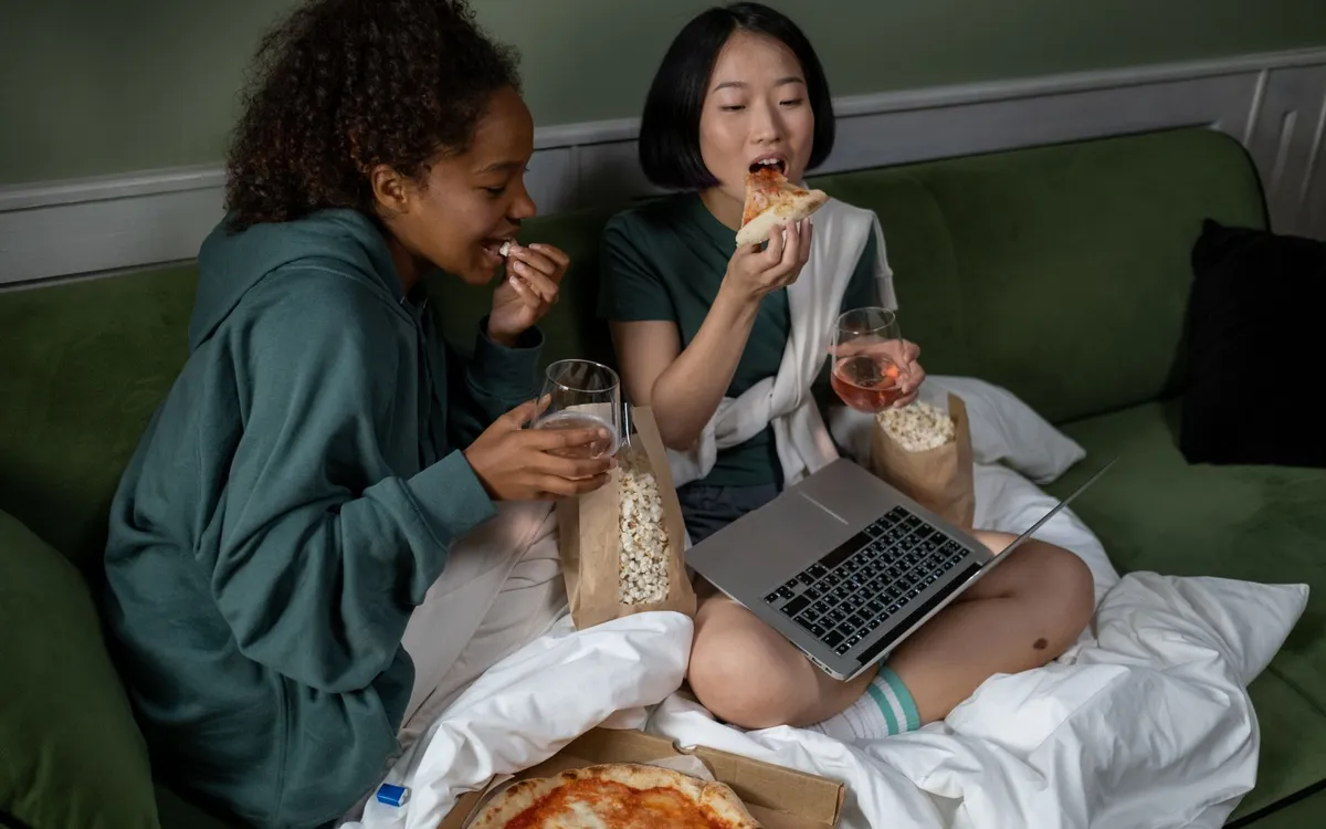 Watching a film on a laptop at night