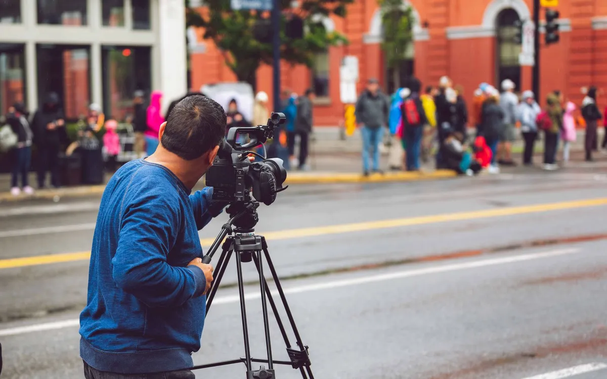 Filming on a city street